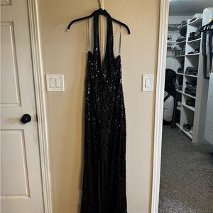Black Sequin Halter Jumpsuit from Fashion Nova